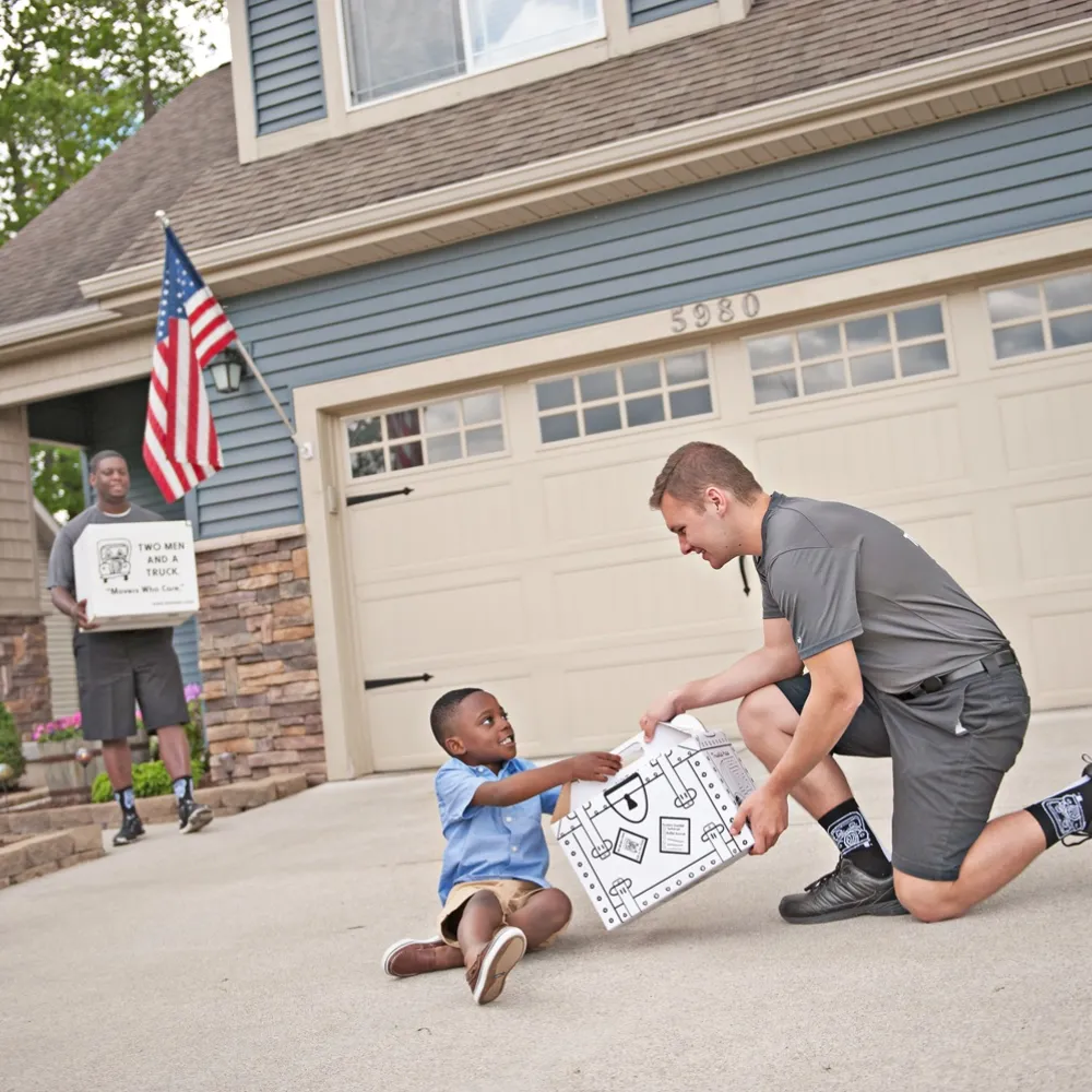Movers talking with kid during a move
