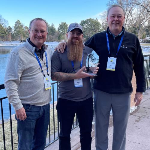 Bill, Ken, and Don - Ken holding 2021 Manager of the Year award