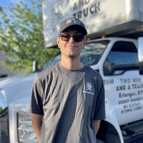 David standing in front of truck
