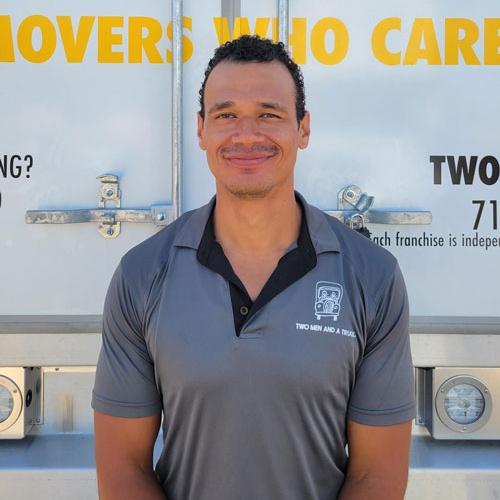 Donoven - employee of the month with two men and a truck