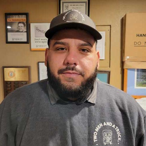 Derek - employee of the month with two men and a truck
