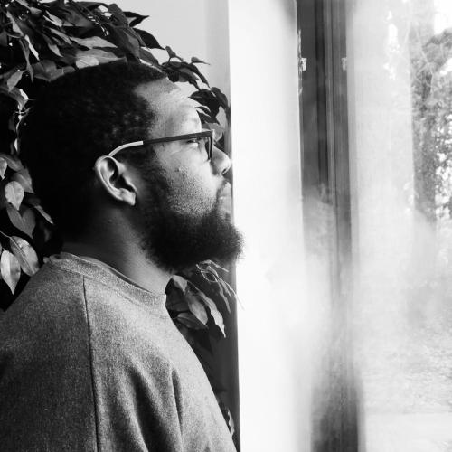 K&#039;D looking out the window on a cold winter morning