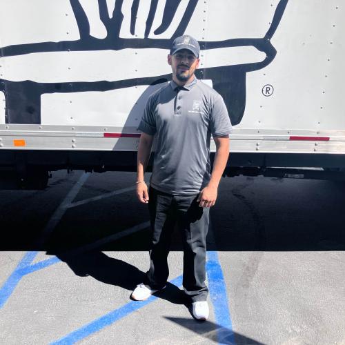 Team Member Dominic with moving truck