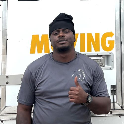 Mover against TMT Moving Truck background