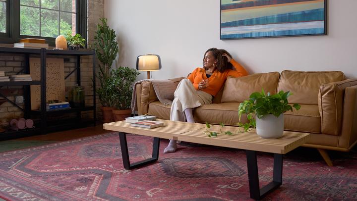 Girl relaxing after moving into her new apartment