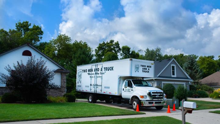 TWO MEN AND A TRUCK moving truck at customer&#039;s house 