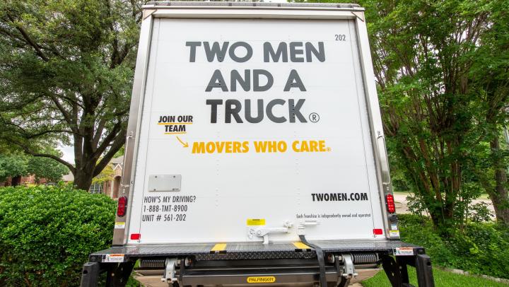 TWO MEN AND A TRUCK moving truck at customer's home