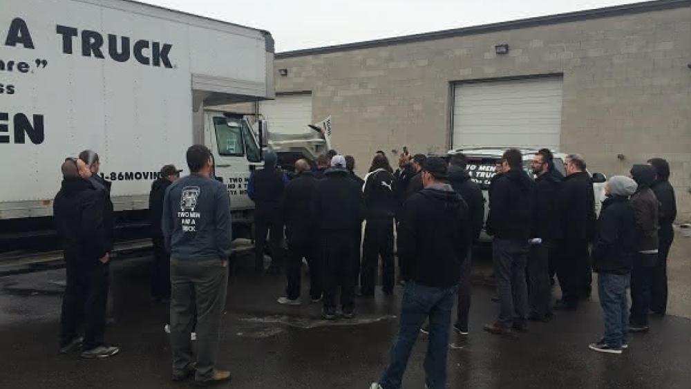 two men and a truck movers for mutts charity drive