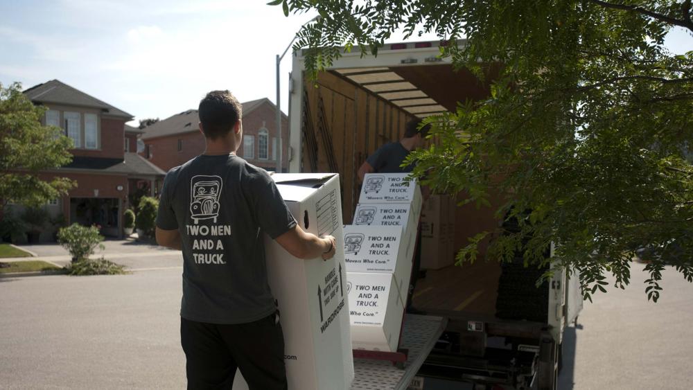 Two men and a truck movers support DAIS and YWCA Rock County 