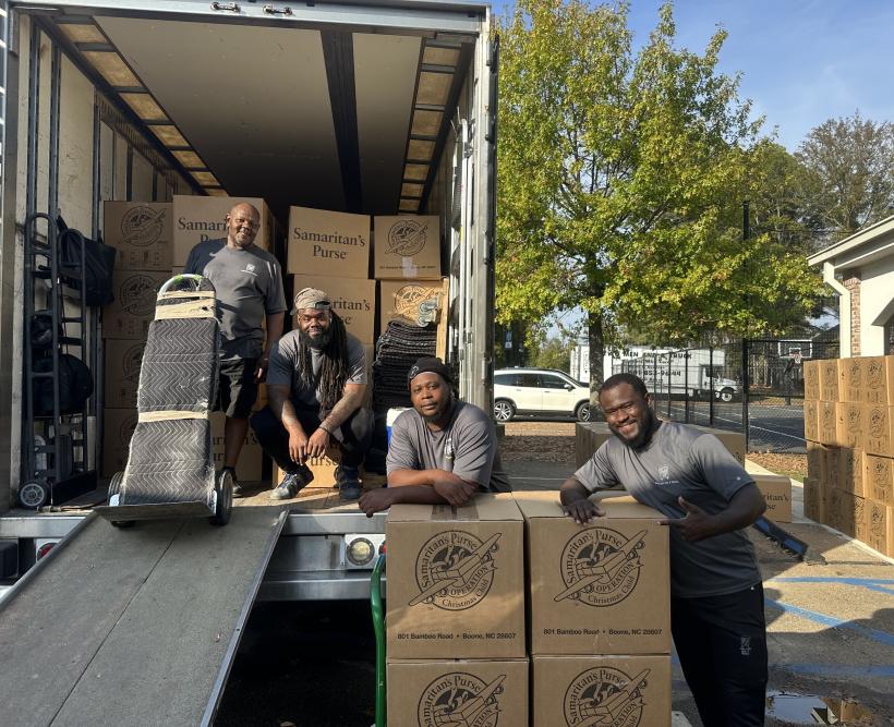 Movers with Samaritan's Purse Christmas boxes 